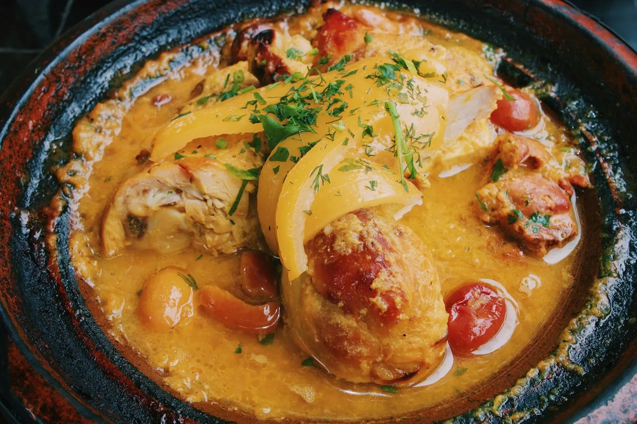 Tajine di pollo con limone confit e olive