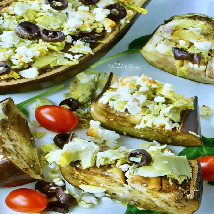 Roast aubergine amb formatge de cabra i patejant